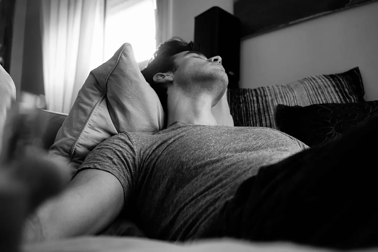 A black and white picture of a man sleeping. Used for a blog post